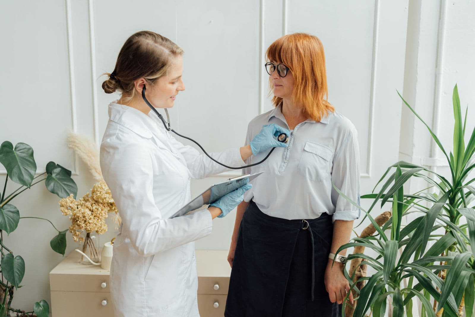 A doctor holding a stethoscope